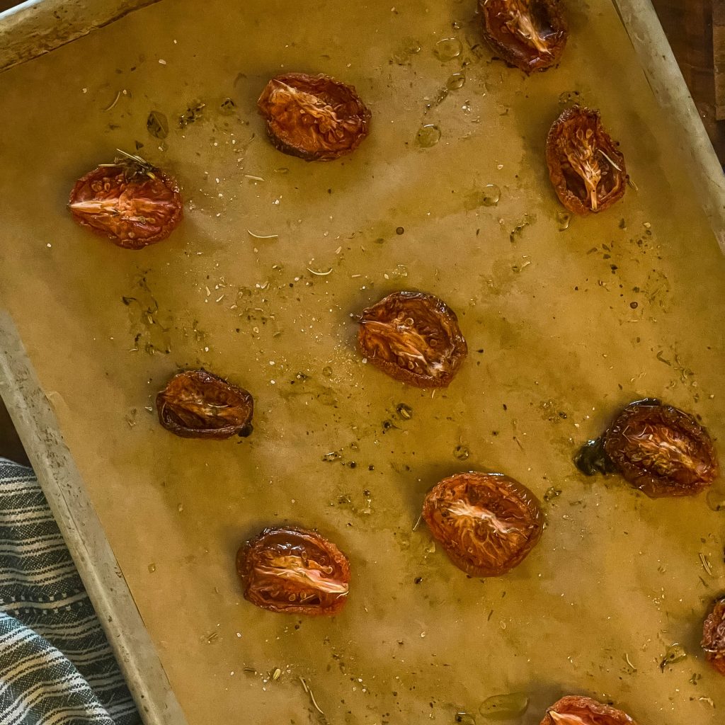 slow roasted tomatoes in a pan