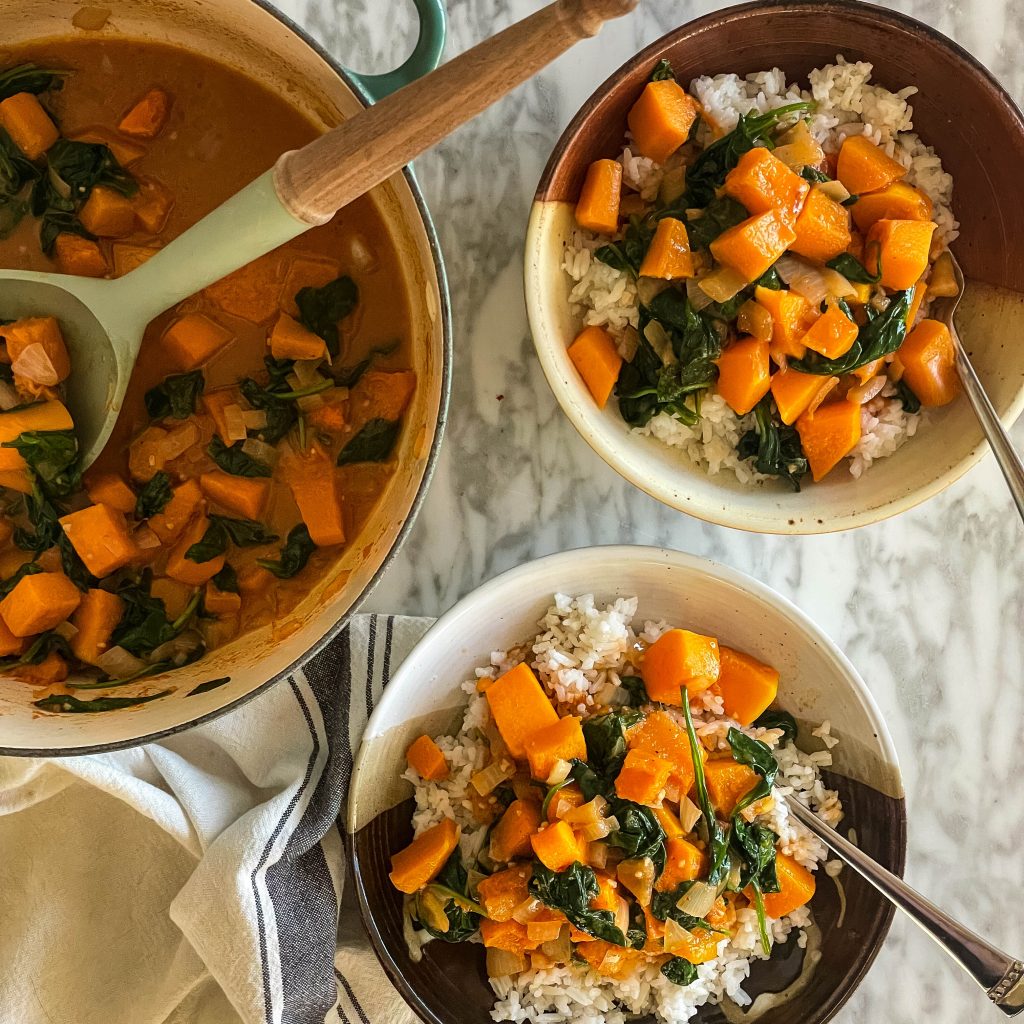 top view of butternut squash and spinach curry and rice