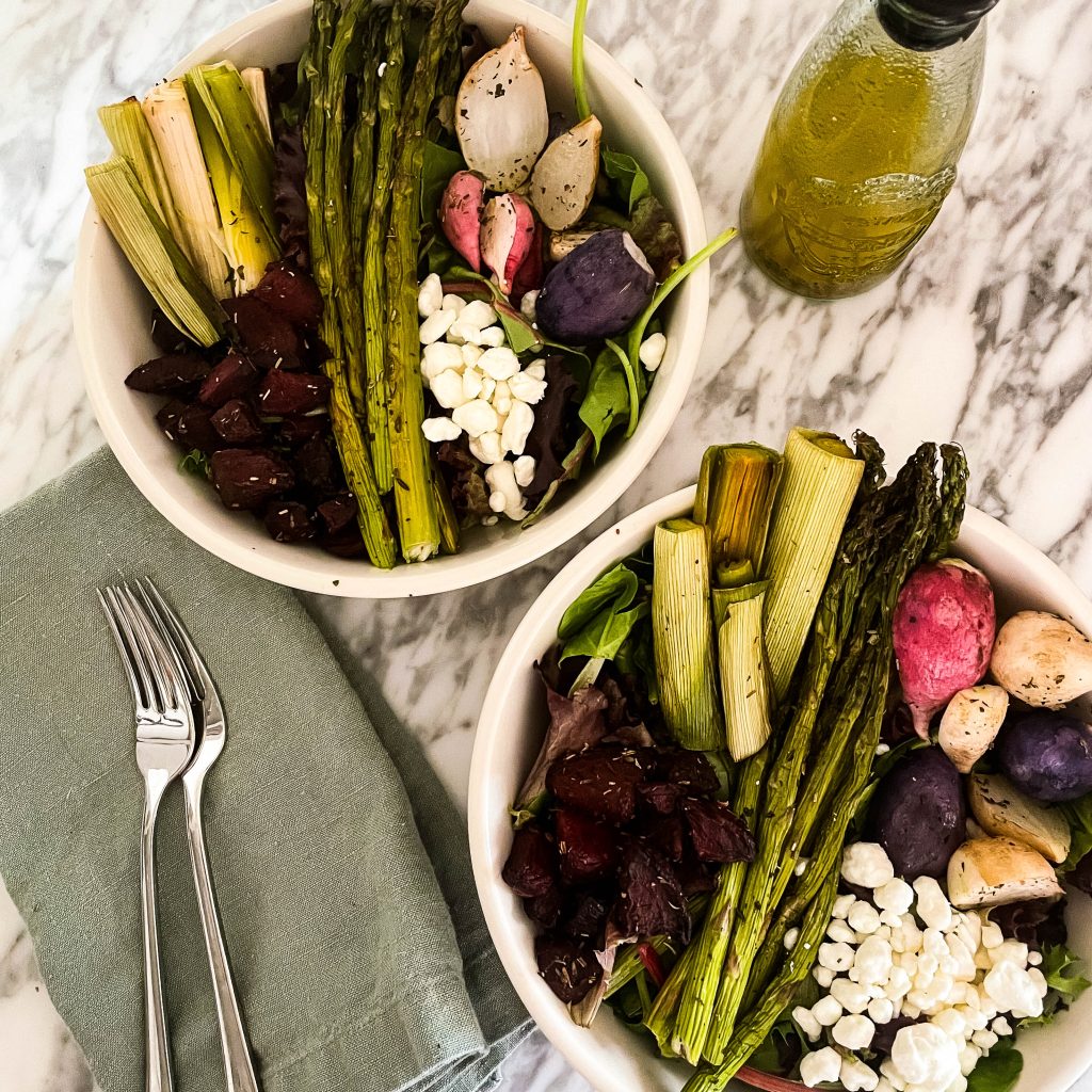 two bowls of spring salad